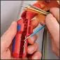 Preview: Anwendung 2 Robustes Knipex Abmantelungswerkzeug Ergostrip für Werkstatt und Handwerk